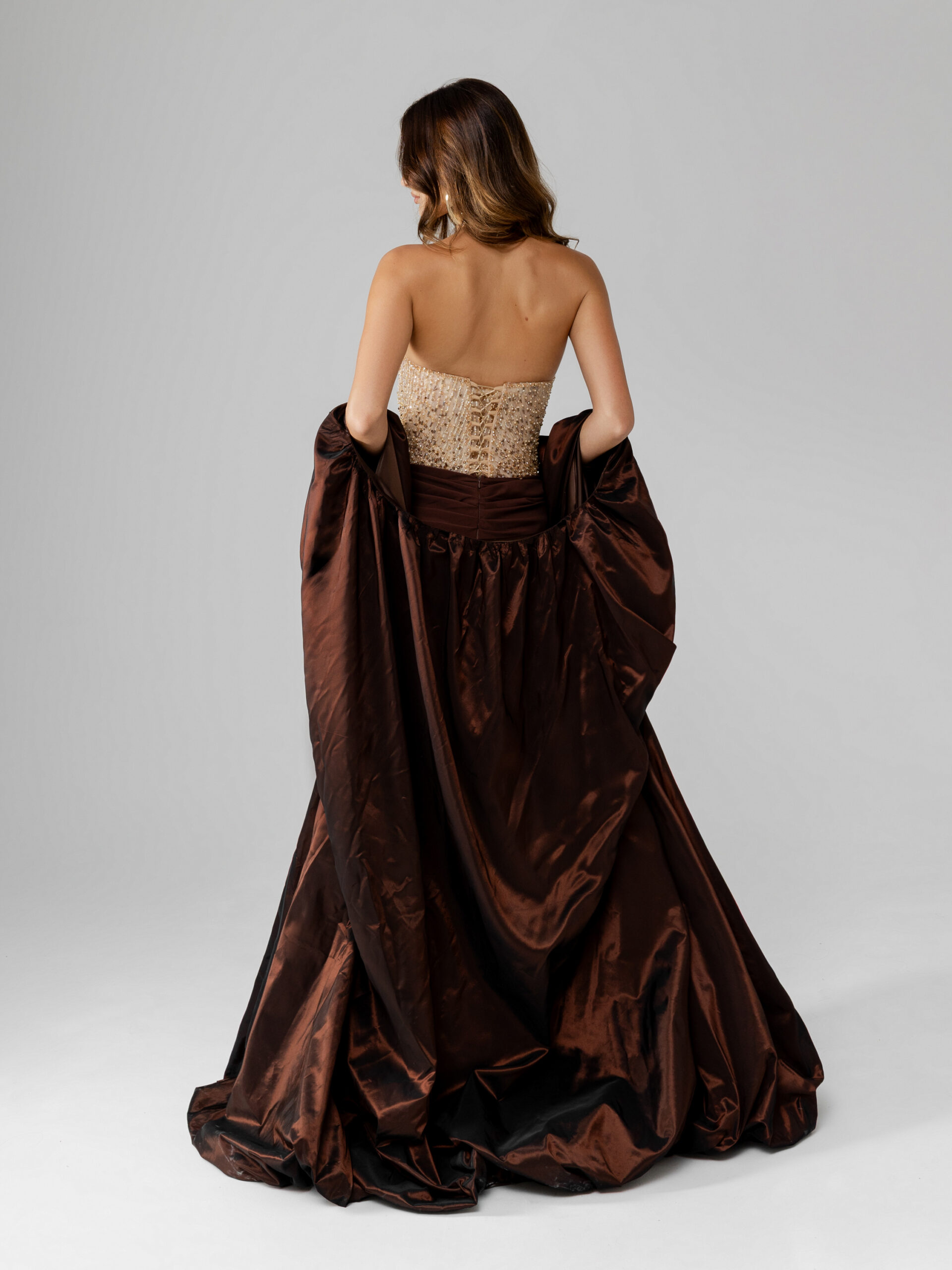 Back picture of oze by THD Victoria dress in Brown & Gold 2 with accessories