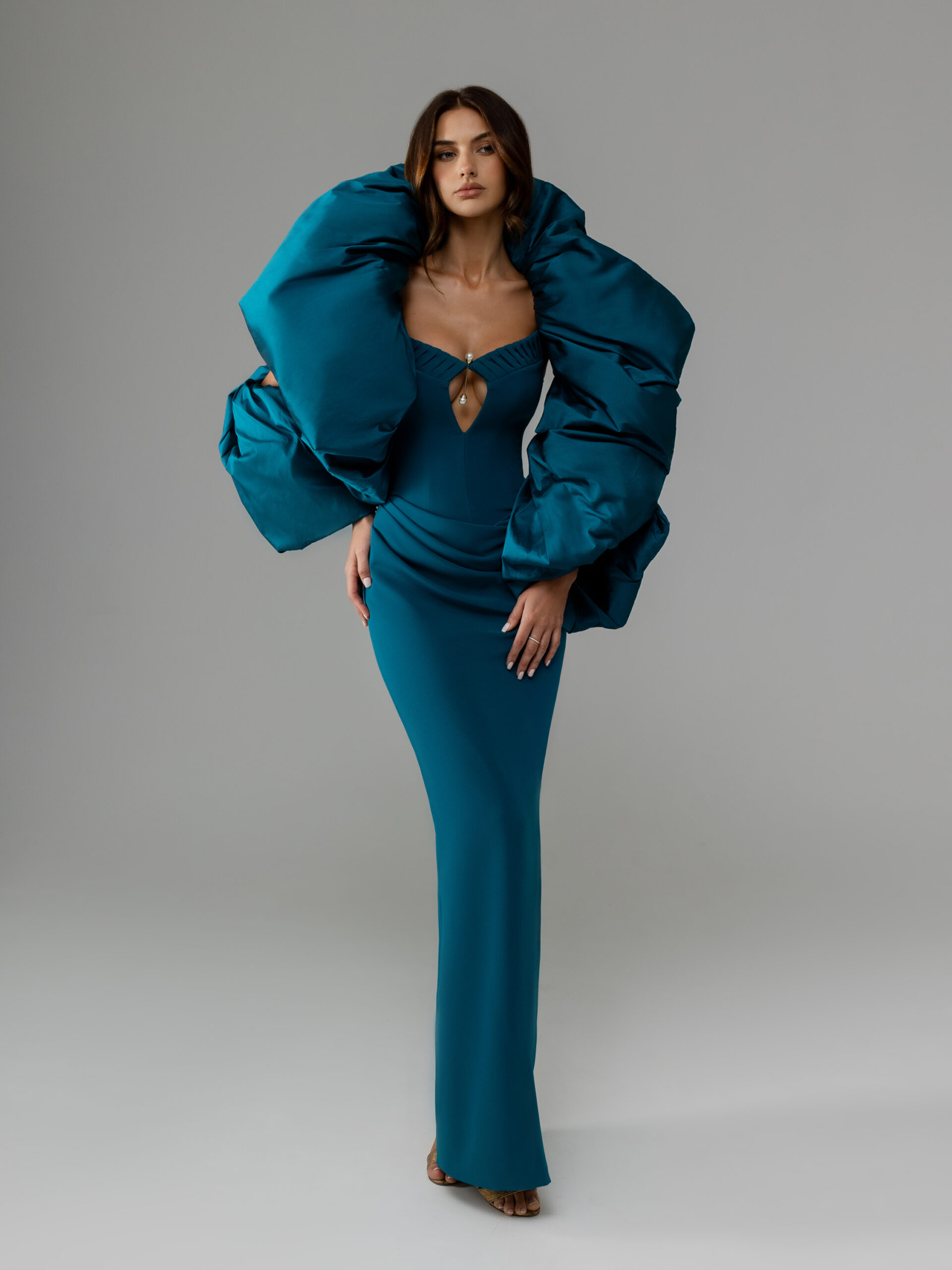 Front picture of oze by THD dress Sienna in blue patrol with cape on shoulders